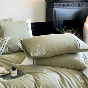 VILZSTUDIOS olive green, pastel pink and ivory white rose-embroidered duvet cover set with white ruffles and contrast piping