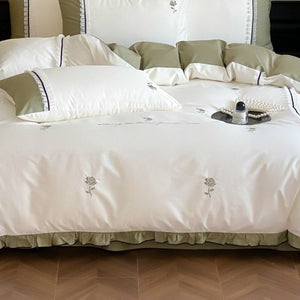 VILZSTUDIOS olive green, pastel pink and ivory white rose-embroidered duvet cover set with white ruffles and contrast piping