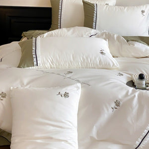VILZSTUDIOS olive green, pastel pink and ivory white rose-embroidered duvet cover set with white ruffles and contrast piping