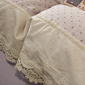 VILZSTUDIOS navy, cream and pastel bedding set with floral or bow-dot patterns and scalloped cream-white lace trim