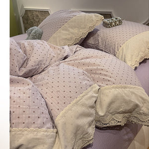 VILZSTUDIOS navy, cream and pastel bedding set with floral or bow-dot patterns and scalloped cream-white lace trim