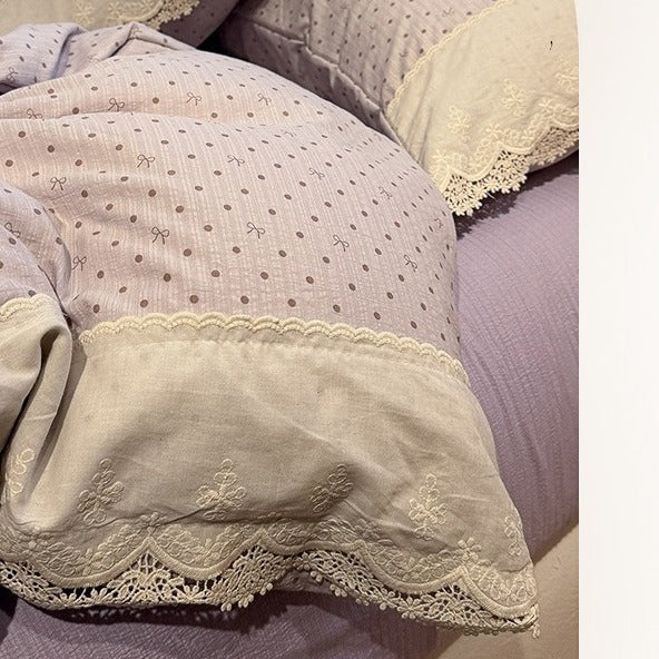 VILZSTUDIOS navy, cream and pastel bedding set with floral or bow-dot patterns and scalloped cream-white lace trim