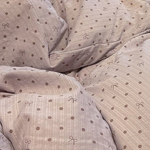 VILZSTUDIOS navy, cream and pastel bedding set with floral or bow-dot patterns and scalloped cream-white lace trim