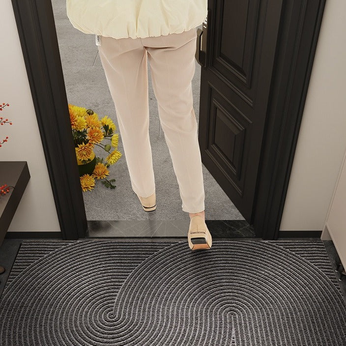 VILZSTUDIOS neutral rectangular door mat with sculpted wave patterns and embossed ribbed ridges