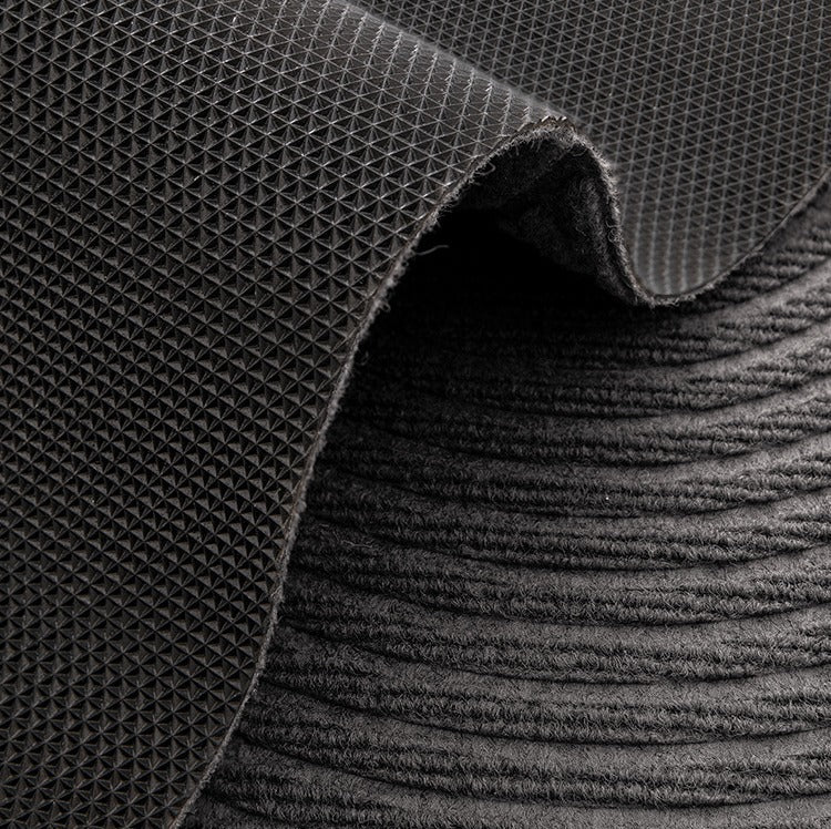 VILZSTUDIOS neutral rectangular door mat with sculpted wave patterns and embossed ribbed ridges