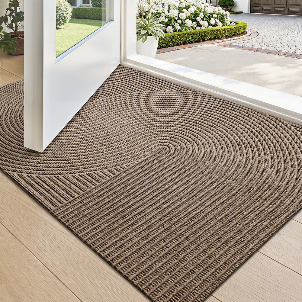 VILZSTUDIOS neutral rectangular door mat with sculpted wave patterns and embossed ribbed ridges