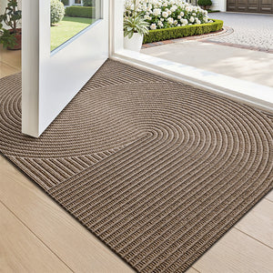VILZSTUDIOS neutral rectangular door mat with sculpted wave patterns and embossed ribbed ridges