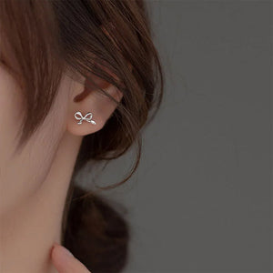 VILZSTUDIOS Minimalist bow stud earrings in sterling silver