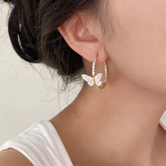 VILZSTUDIOS Sparkling hoop earrings with butterfly design
