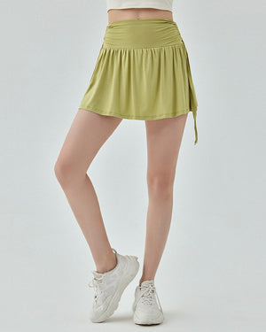 VILZSTUDIOS Green tennis skirt with bows at the waist