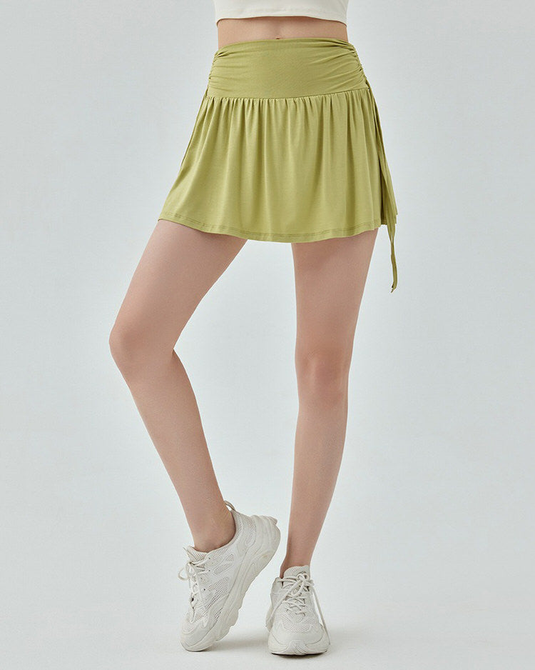 VILZSTUDIOS Green tennis skirt with bows at the waist