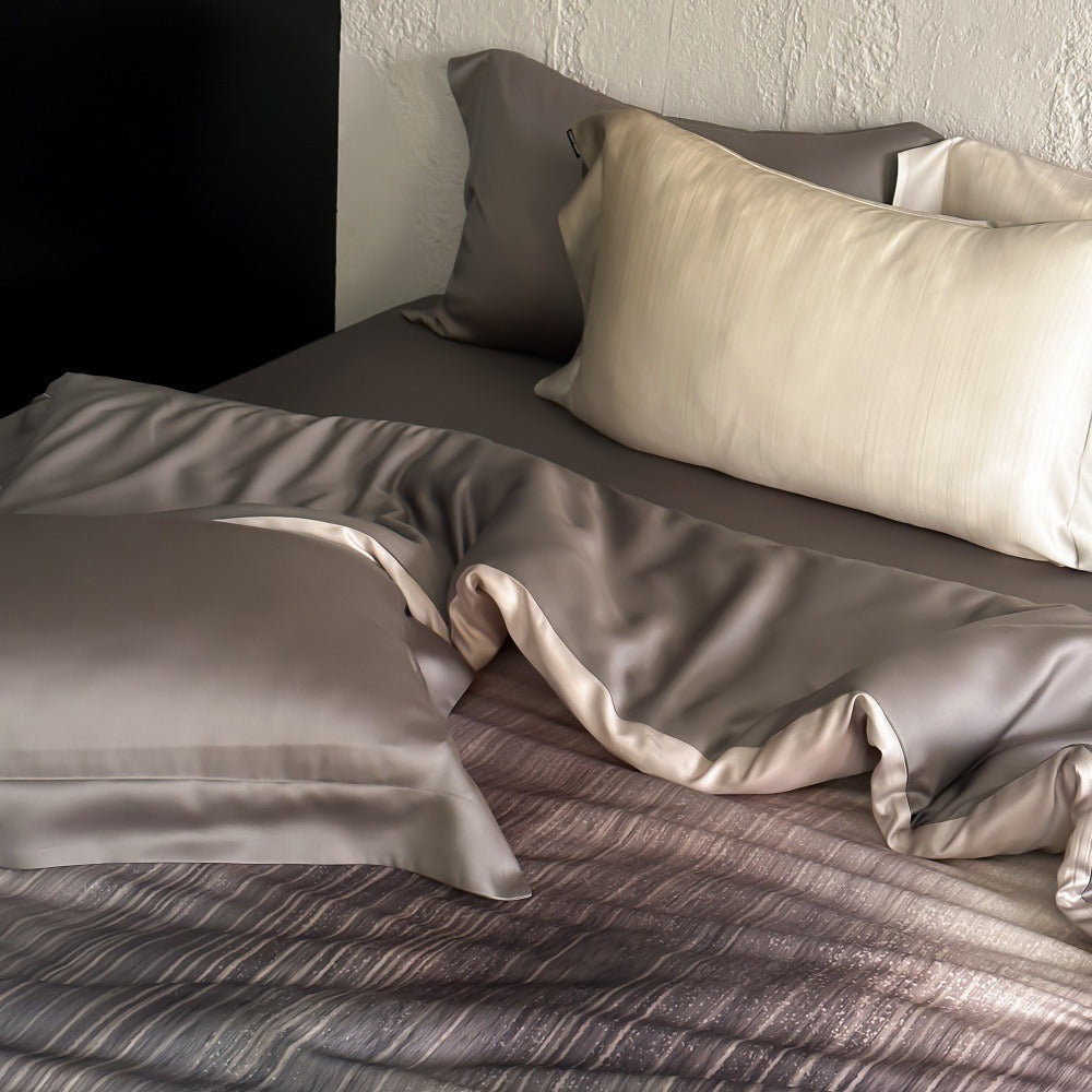 VILZSTUDIOS taupe-grey and ivory ombré satin duvet cover set with subtle ripple patterning and flanged borders