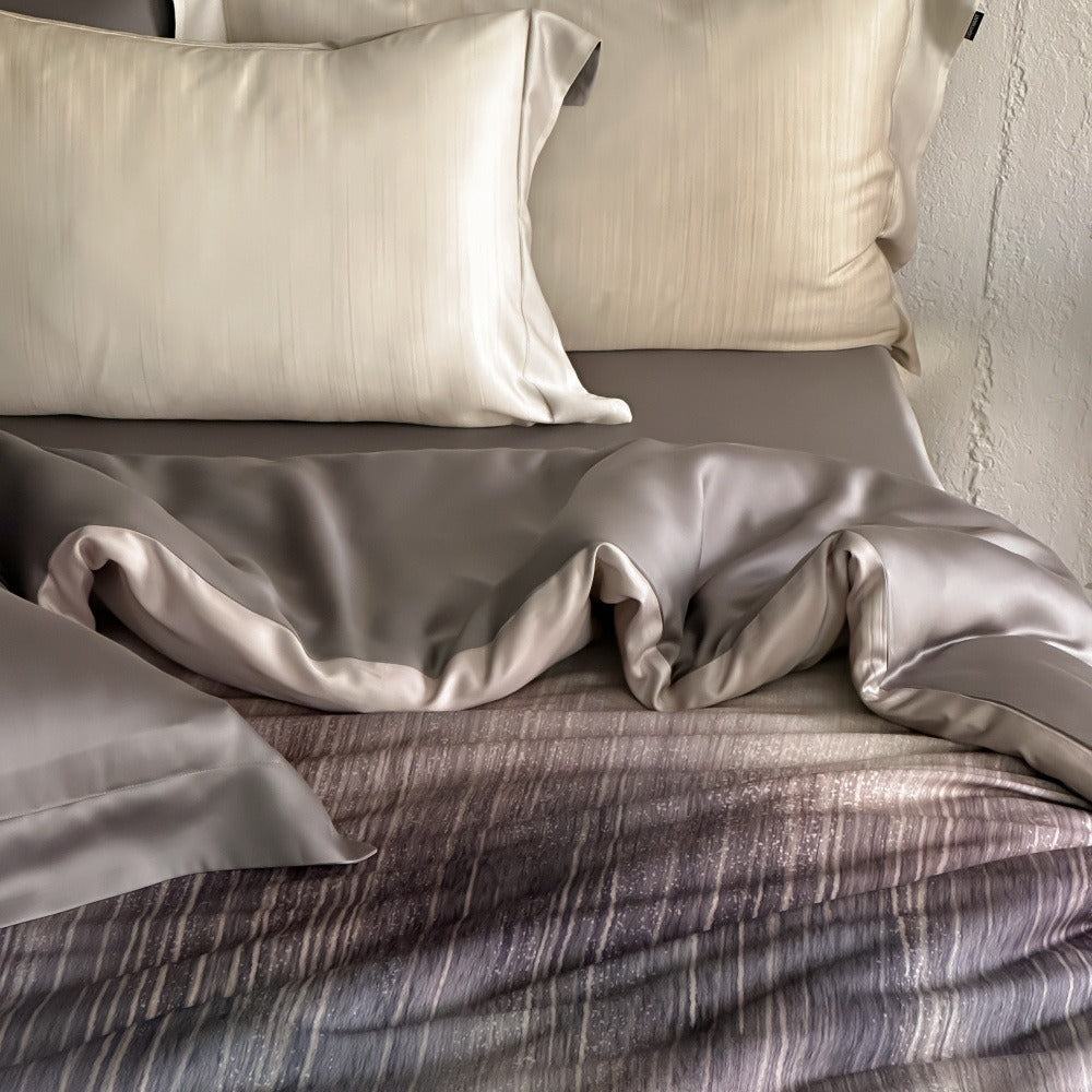 VILZSTUDIOS taupe-grey and ivory ombré satin duvet cover set with subtle ripple patterning and flanged borders