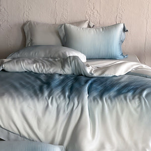 VILZSTUDIOS taupe-grey and ivory ombré satin duvet cover set with subtle ripple patterning and flanged borders