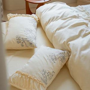 VILZSTUDIOS Ivory duvet cover set with blue-grey floral sketches and gathered ruffle trim