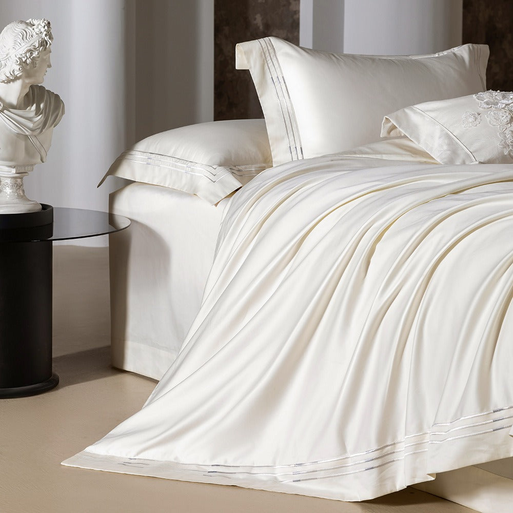 VILZSTUDIOS ivory satin bedding set with triple metallic embroidered stripes and wide flanged borders
