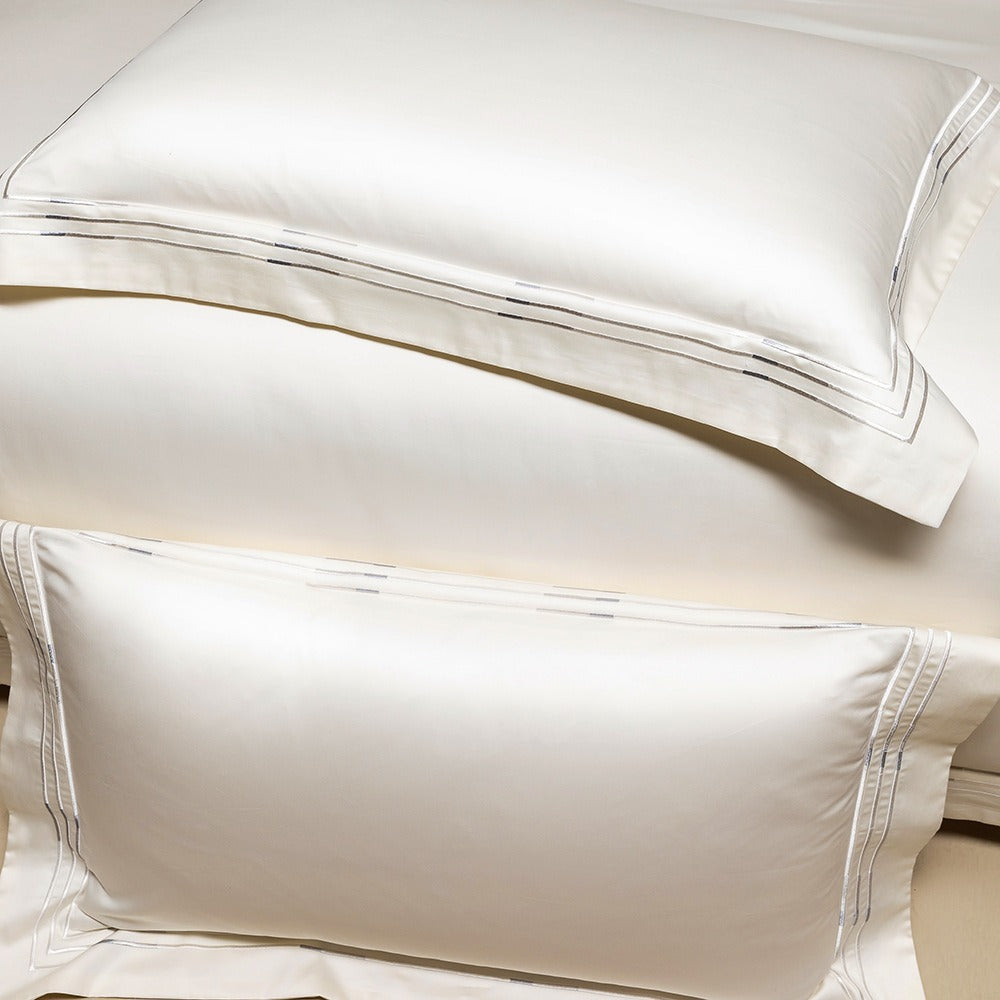 VILZSTUDIOS ivory satin bedding set with triple metallic embroidered stripes and wide flanged borders