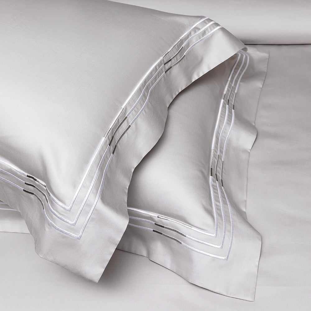 VILZSTUDIOS ivory satin bedding set with triple metallic embroidered stripes and wide flanged borders