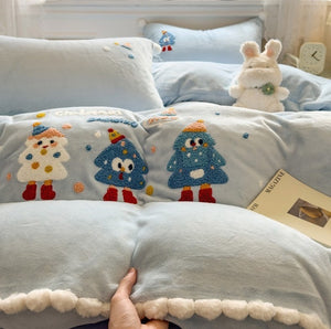 VILZSTUDIOS baby blue and camel fleece bedding set with raised tree and penguin motifs and white pom-pom trim