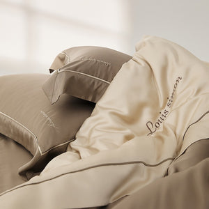 VILZSTUDIOS two-tone satin duvet cover set with script embroidery and contrast piping in taupe, mauve, rust-red or silvery gray