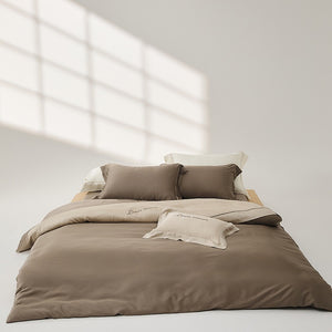 VILZSTUDIOS two-tone satin duvet cover set with script embroidery and contrast piping in taupe, mauve, rust-red or silvery gray