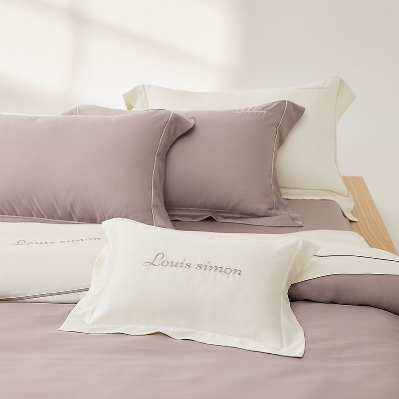 VILZSTUDIOS two-tone satin duvet cover set with script embroidery and contrast piping in taupe, mauve, rust-red or silvery gray