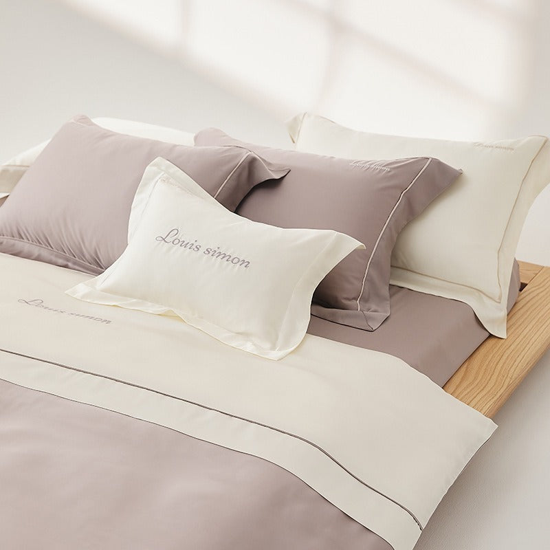 VILZSTUDIOS two-tone satin duvet cover set with script embroidery and contrast piping in taupe, mauve, rust-red or silvery gray