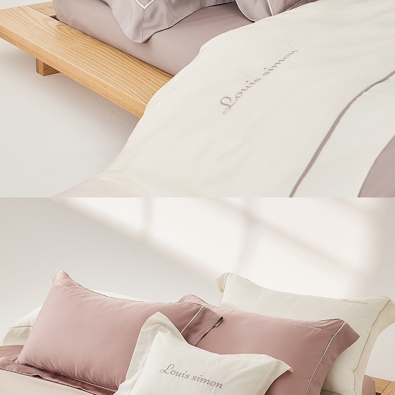 VILZSTUDIOS two-tone satin duvet cover set with script embroidery and contrast piping in taupe, mauve, rust-red or silvery gray