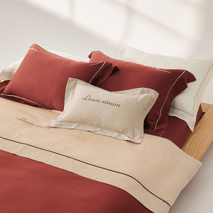 VILZSTUDIOS two-tone satin duvet cover set with script embroidery and contrast piping in taupe, mauve, rust-red or silvery gray
