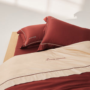VILZSTUDIOS two-tone satin duvet cover set with script embroidery and contrast piping in taupe, mauve, rust-red or silvery gray