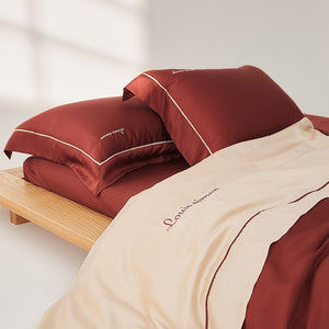 VILZSTUDIOS two-tone satin duvet cover set with script embroidery and contrast piping in taupe, mauve, rust-red or silvery gray