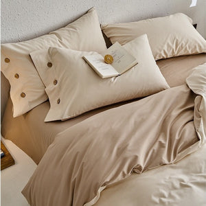 VILZSTUDIOS neutral two-tone reversible duvet cover set with wooden button pillowcases