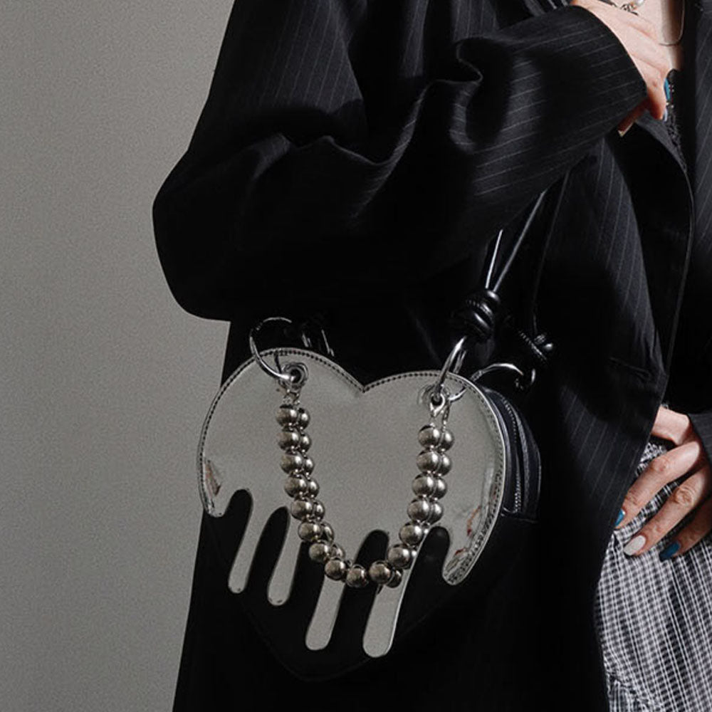VILZSTUDIOS Heart-shaped handbag with silver drip design