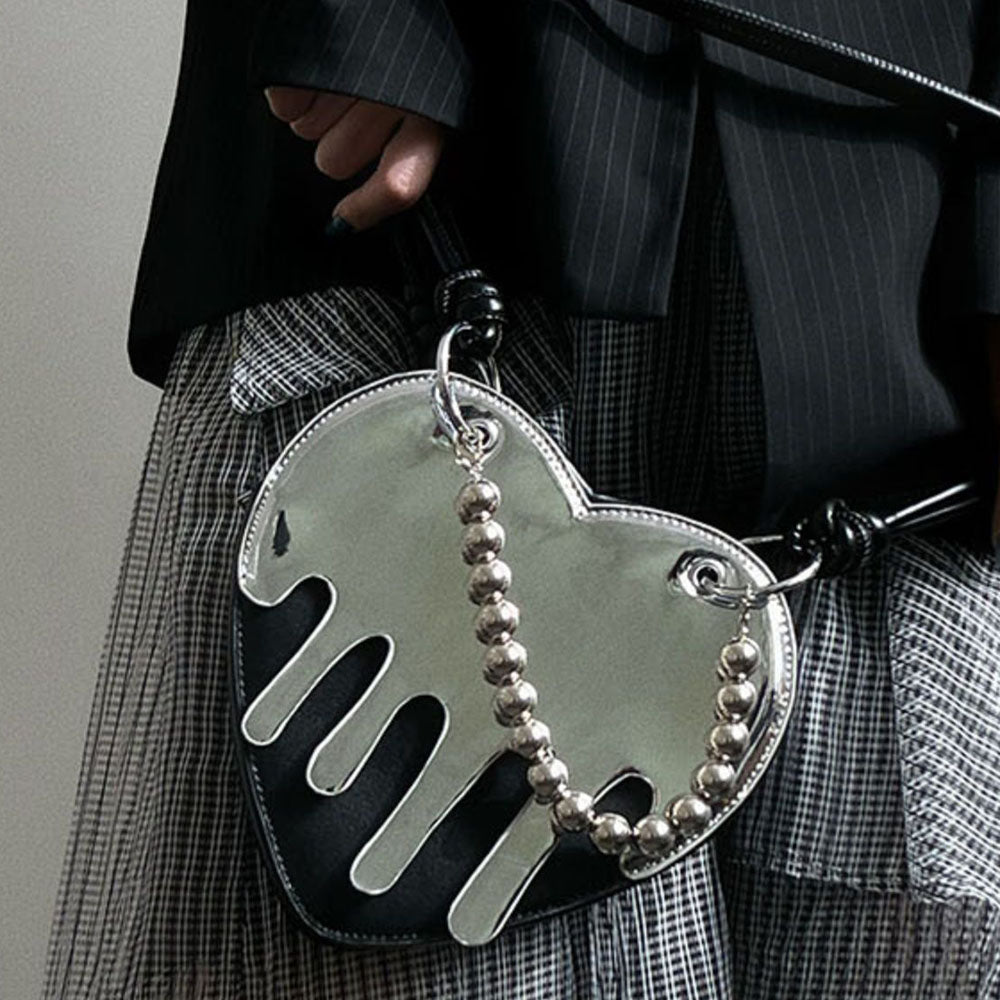 VILZSTUDIOS Heart-shaped handbag with silver drip design