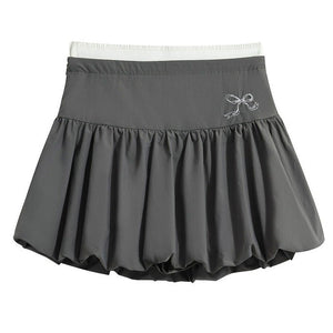 VILZSTUDIOS Y2K inspired balloon mini skirt with high waist and pleated design