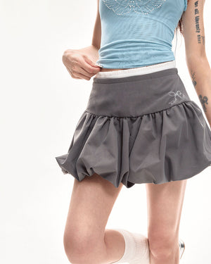 VILZSTUDIOS Y2K inspired balloon mini skirt with high waist and pleated design