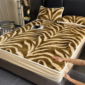 VILZSTUDIOS earth-toned zebra-stripe and mottled marble fleece fitted sheet with contrasting plush trim