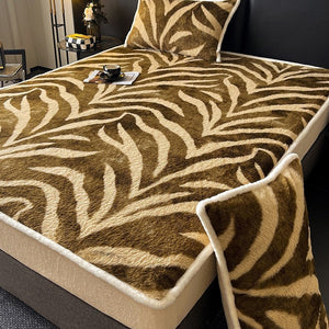 VILZSTUDIOS earth-toned zebra-stripe and mottled marble fleece fitted sheet with contrasting plush trim