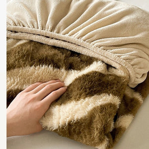 VILZSTUDIOS earth-toned zebra-stripe and mottled marble fleece fitted sheet with contrasting plush trim