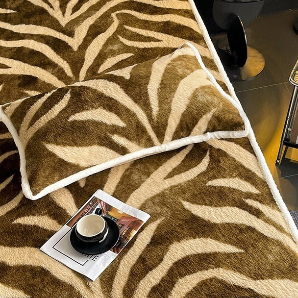 VILZSTUDIOS earth-toned zebra-stripe and mottled marble fleece fitted sheet with contrasting plush trim